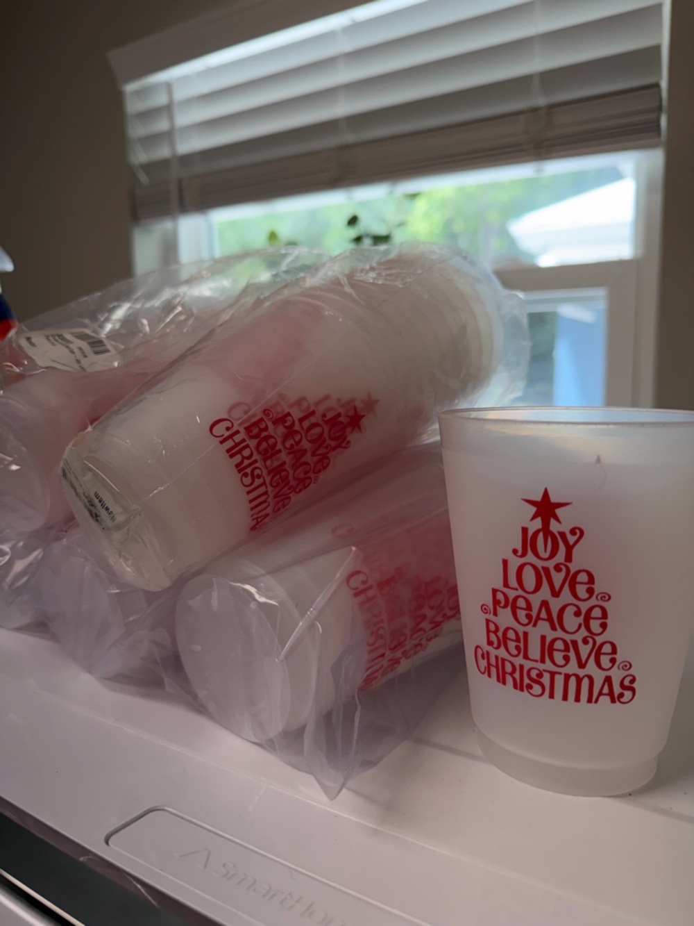 50 Festive Frosted Plastic Holiday Cups with Red Tree Text